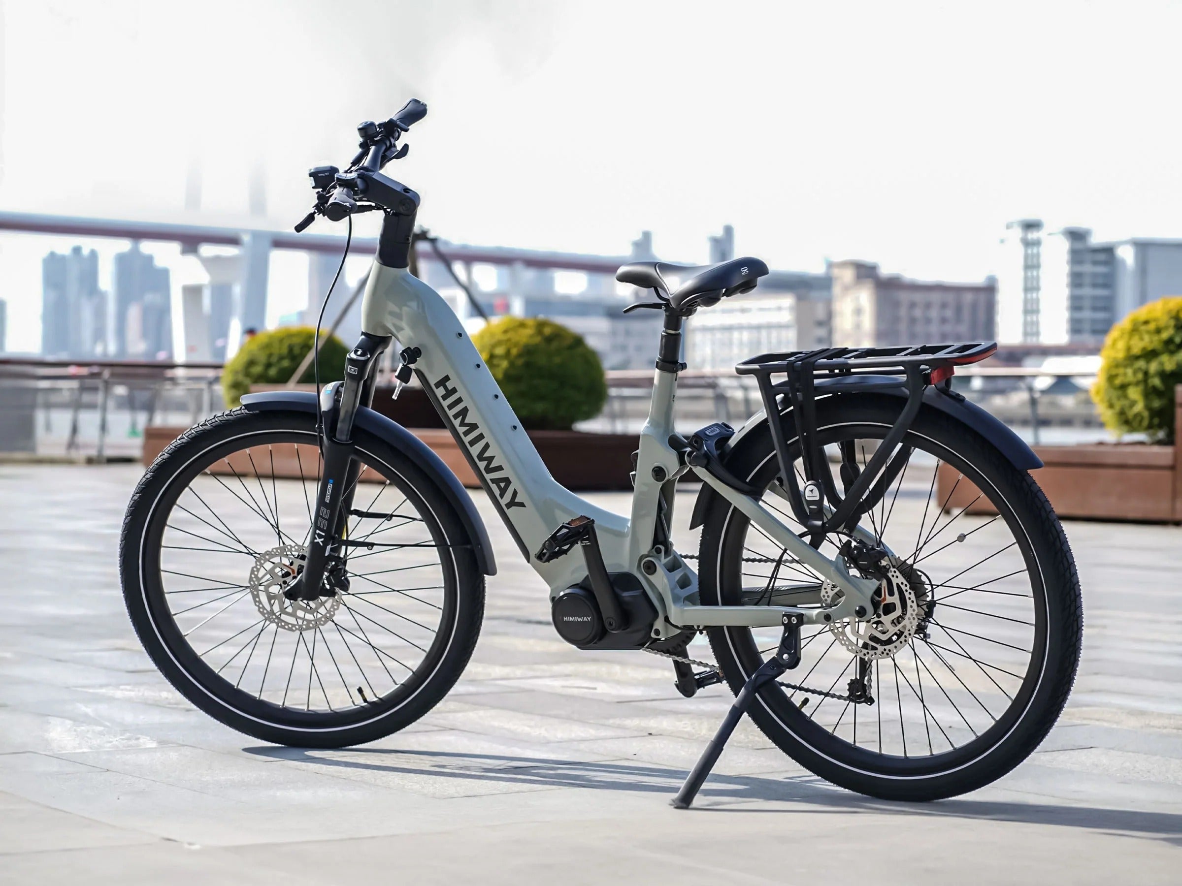 Electric bike with 'Himiway' branding on a city street background